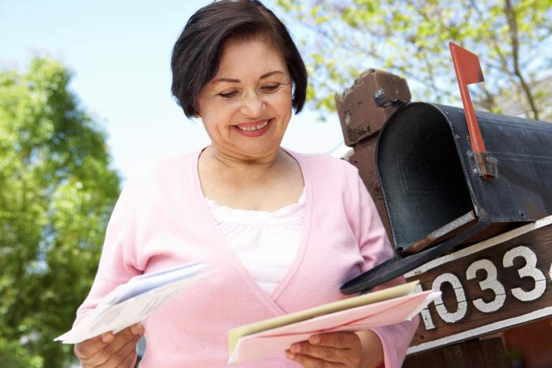 A student reads her mail.